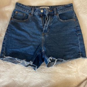 Distressed bottom jean shorts